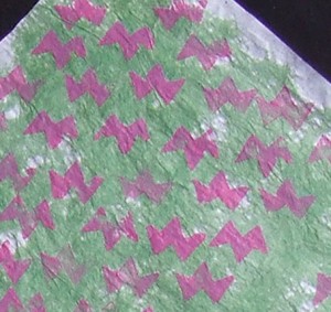 A close up of one of the stamped papers